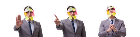 Businessman with many reminders isolated on whiteの写真素材