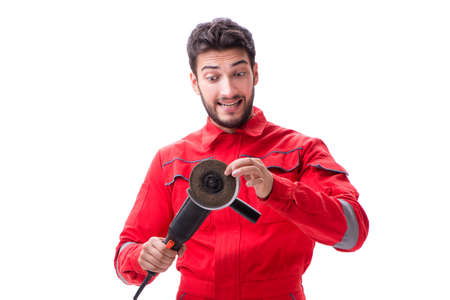 Young man with circular polisher isolated on white