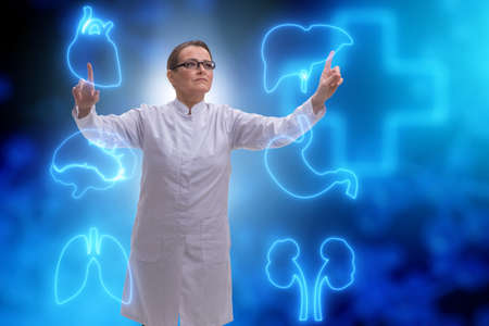 Woman doctor in telemedicine futuristic conceptの写真素材