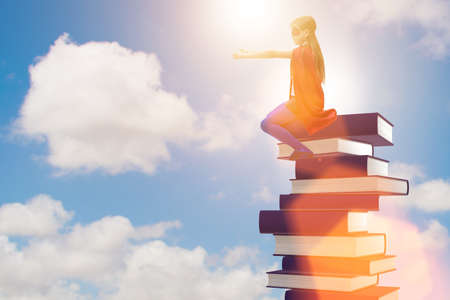 Superhero little girl in education conceptの写真素材