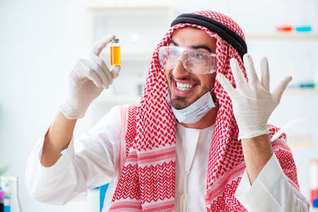 Pharmaceutical industry chemist working on labの写真素材