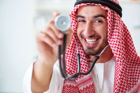 Arab saudi doctor with stethoscope in hospitalの写真素材