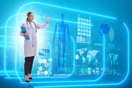 Woman doctor in telemedicine futuristic conceptの写真素材