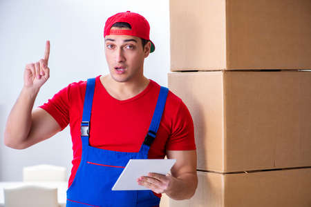 Contractor worker moving boxes during office move