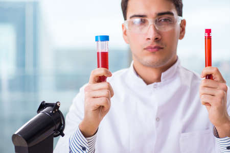 Male chemist working in labの写真素材