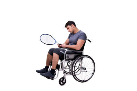 Tennis player recovering from injury on wheelchairの写真素材