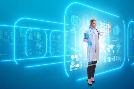 Woman doctor in telemedicine futuristic conceptの写真素材