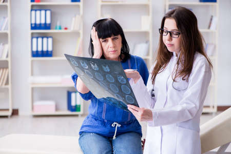 Senior patient visiting doctor for regular check-upの写真素材