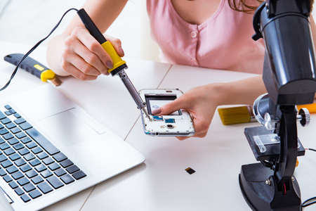 Mobile phone repair in workshop