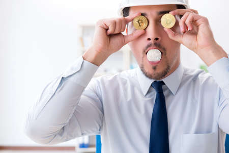 Man in bitcoin mining business conceptの写真素材