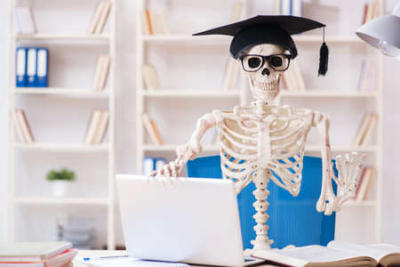 Student skeleton preparing for exams