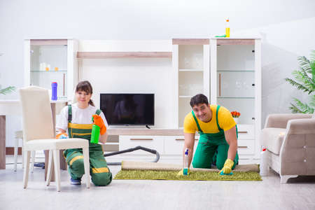 Cleaning professional contractors working at houseの写真素材