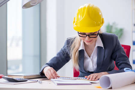 Woman architect working on the project