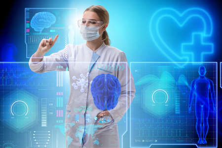 Woman doctor in telemedicine futuristic conceptの写真素材