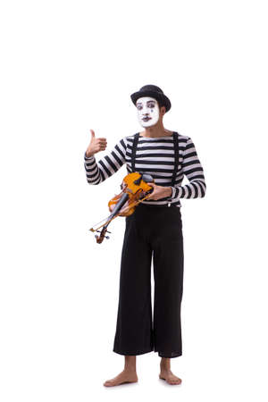 Mime playing violin isolated on whiteの写真素材