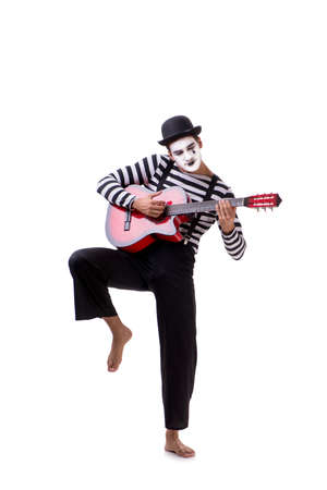 Mime playing guitar isolated on whiteの写真素材