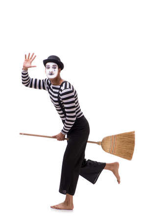 Mime with broom isolated on white backgroundの写真素材