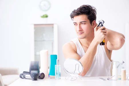 Young handsome man staring in the mirrorの写真素材