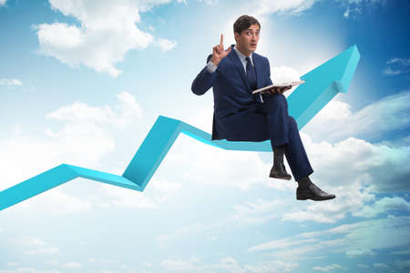 Businessman in economic recovery conceptの写真素材