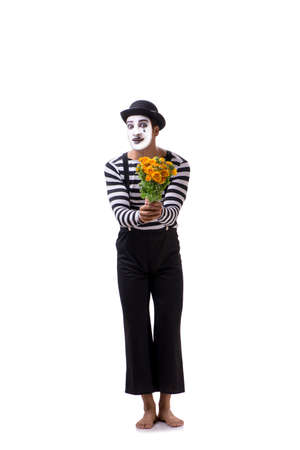 Mime with bunch of flowers isolated on whiteの写真素材