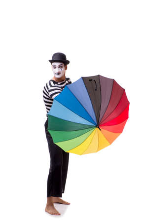 Mime with umbrella isolated on white backgroundの写真素材