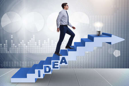 Concept of idea with businessman climbing steps stairs
