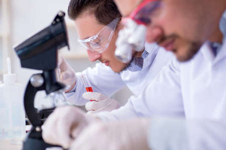 Team of chemists working in the lab