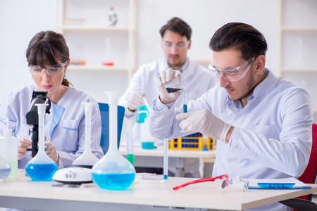 Team of chemists working in the labの写真素材