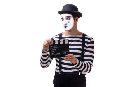 Mime with movie clapperboard isolated on white