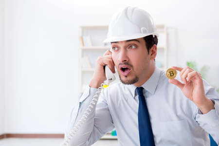 Man in bitcoin mining business conceptの写真素材