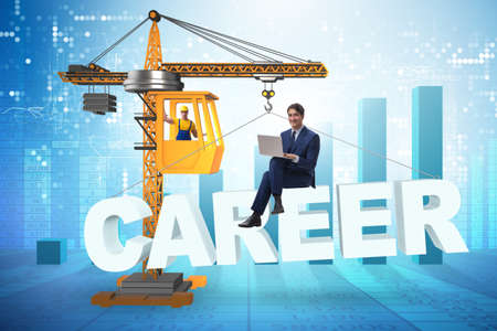 Businessman in career progression concept with craneの写真素材
