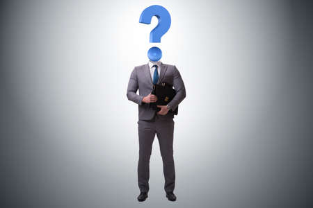 Businessman with question mark instead of headの写真素材