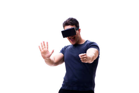 Man playing with virtual reality glasses on white background