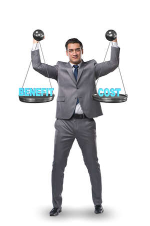 Businessman in cost benefit balance conceptの写真素材