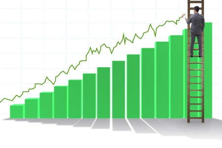 Businessman climbing towards growth in statisticsの写真素材