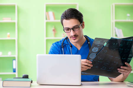 Young doctor working in the hospitalの写真素材