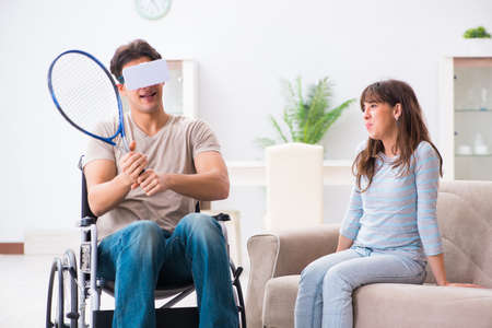 Disabled man with virtual glassesの写真素材