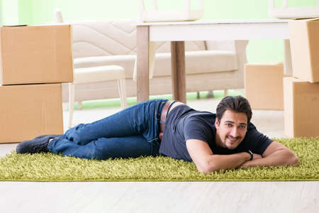 Man moving house with boxesの写真素材