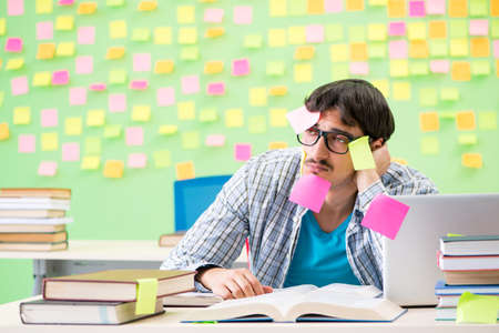 Student with many conflicting prioritiesの写真素材