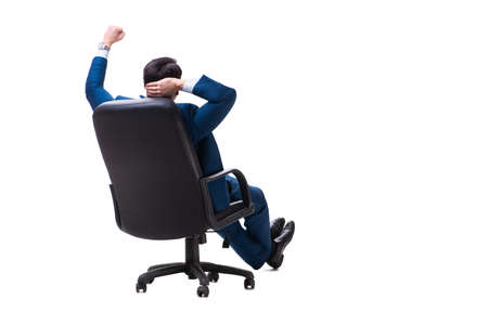 Businessman sitting on chair isolated on whiteの写真素材