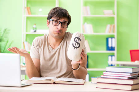 Young student in expensive tuition conceptの写真素材