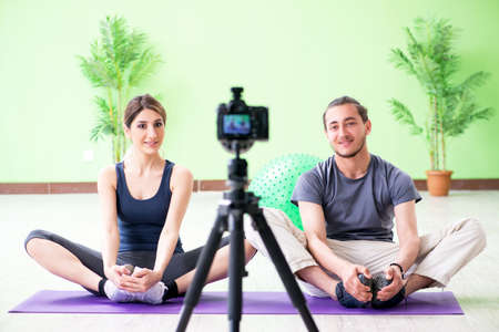 Pair recording sports video for vlogの写真素材