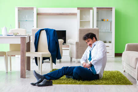 Man dressing up and late for workの写真素材