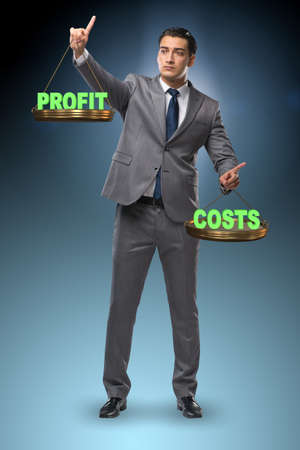 Businessman in profit benefit balance conceptの写真素材