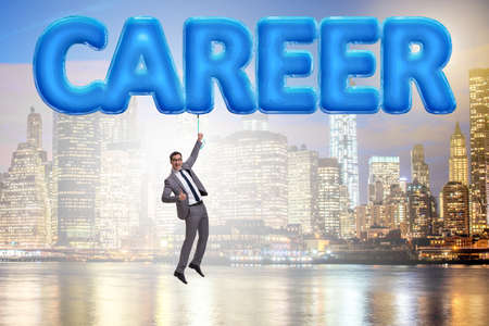 Businessman flying in career conceptの写真素材