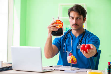 Doctor doing blood analysis in the labの写真素材
