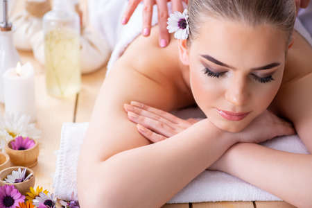 Woman during massage session in spaの写真素材
