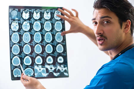 Young handsome doctor radiologyst working in hospital