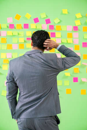 Businessman with many business prioritiesの写真素材