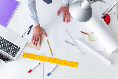 Engineer working on new project drawings